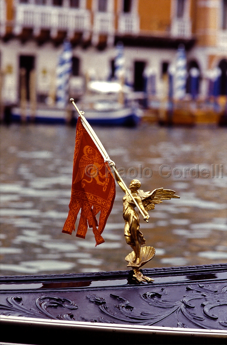 Small Golden Statue on a Gondola, Venice, Veneto, Italy
 (cod:Venice 10)